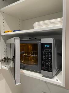 Kuchyň nebo kuchyňský kout v ubytování Sunset Resort APARTAMENT DZIESIĄTKA przy plaży