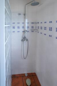 Ванна кімната в Casa Beira Mar