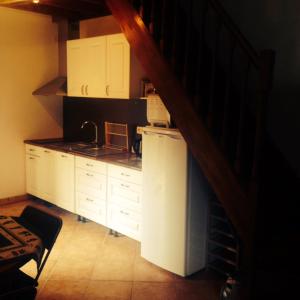 Η κουζίνα ή μικρή κουζίνα στο La petite maison d'Evran +9 φωτογραφίες