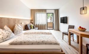 Postel nebo postele na pokoji v ubytování Pension Appartment Hecherhof
