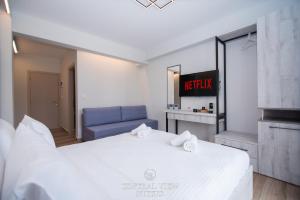 Posteľ alebo postele v izbe v ubytovaní CentralViewSuites