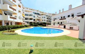 Piscina en o cerca de Pueblo del parque 12 - Terraza - Piscina y Playa- Urbanización tranquila- Perfecto para descansar
