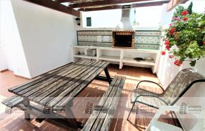 Zona de estar de Pueblo del parque 12 - Terraza - Piscina y Playa- Urbanización tranquila- Perfecto para descansar