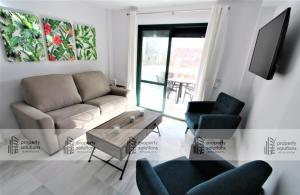 Zona de estar de Pueblo del parque 12 - Terraza - Piscina y Playa- Urbanización tranquila- Perfecto para descansar