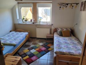 Postel nebo postele na pokoji v ubytování Urlaub auf dem Bauernhof