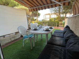 Posedenie v ubytovaní Platja d'Aro - Apartamento en primera línea de mar con parking