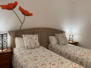 A bed or beds in a room at Can Ramon casa con garaje