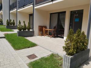 Budova, v ktorej sa apartmán nachádza + 1 fotografia