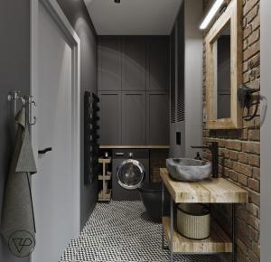 a bathroom with a sink and a toilet at Apartament z widokiem na Zatokę Gdańską in Gdańsk