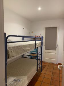 A bed or beds in a room at Can Ramon casa con garaje