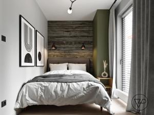 a bedroom with a bed and a wooden wall at Apartament z widokiem na Zatokę Gdańską in Gdańsk