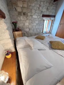 Postel nebo postele na pokoji v ubytování House Ivančić-free parking