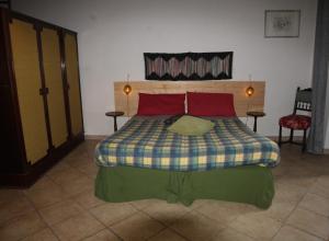 Postel nebo postele na pokoji v ubytování L'Angoletto