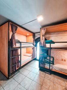 Postel nebo postele na pokoji v ubytování MedioMundo Hostel