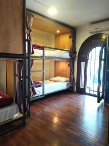 Postel nebo postele na pokoji v ubytování MedioMundo Hostel