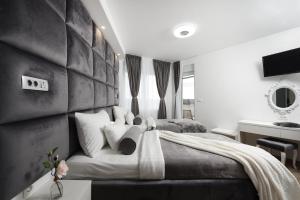 Cama o camas de una habitación en Villa Zadar