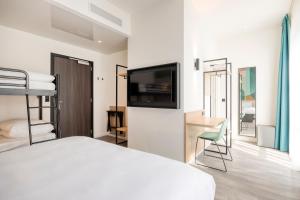 B&B HOTEL Hasselt客房内的一张或多张床位