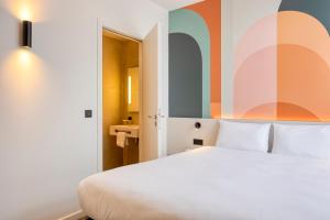 B&B HOTEL Hasselt客房内的一张或多张床位