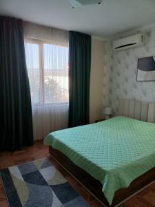 A bed or beds in a room at Sun Wave EXCLUSIVE Még 5 kép