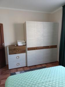 A bed or beds in a room at Sun Wave EXCLUSIVE