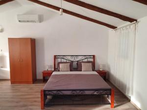 Posteľ alebo postele v izbe v ubytovaní Private Accommodation Kanegra