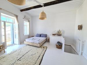 A bed or beds in a room at Townhouse Christos