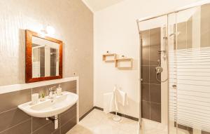 a bathroom with a sink and a shower at Affittacamere Nonno Natalino in Castelsardo