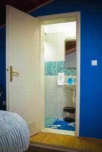 Ванная комната в Royal TSV Rooms