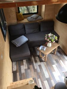 an overhead view of a living room in a tiny house at TINY HOUSE LA FARIGOULE in Pélissanne