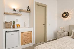 A bed or beds in a room at Naxos Blue Sky