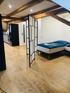 Postel nebo postele na pokoji v ubytování Studio-Apartments Boulevard