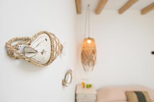 A bed or beds in a room at Naxos Blue Sky