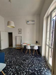 Fotografija v galeriji nastanitve Dimora Trinity - Central Rooms v mestu Polignano a Mare