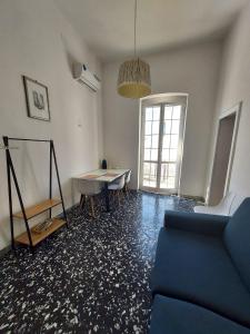Predel za sedenje v nastanitvi Dimora Trinity - Central Rooms