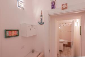 Kúpeľňa v ubytovaní Approdo Rooms - Eja Sardinia