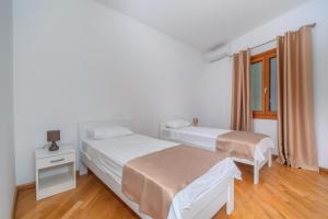 Postel nebo postele na pokoji v ubytování Alex Lux sea view aparmtent 2