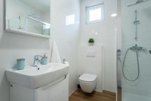 Vannituba majutusasutuses Apartment Mia Šimuni