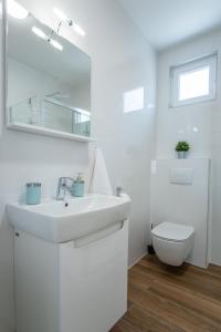 Vannituba majutusasutuses Apartment Mia Šimuni