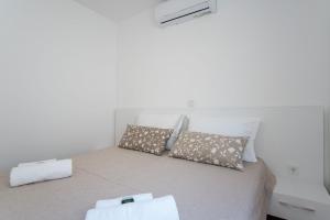 Voodi või voodid majutusasutuse Apartment Mia Šimuni toas