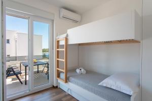 Voodi või voodid majutusasutuse Apartment Mia Šimuni toas