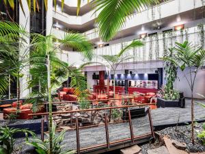 Restaurant ou autre lieu de restauration dans l'établissement Novotel Darwin CBD