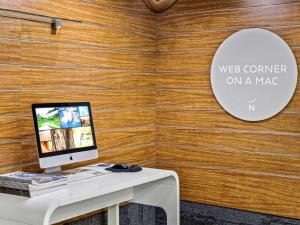 Télévision ou salle de divertissement dans l'établissement Novotel Darwin CBD