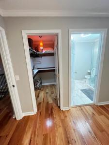 an empty room with a door leading to a bedroom at Atlanta Unit 2 Room 2 - Peaceful Weekend Getaway Private Bedroom & Bathroom in Atlanta +10 photos