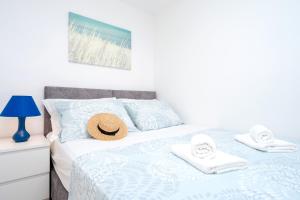 Łóżko lub łóżka w pokoju w obiekcie Sea Pearl - ZF Hvar