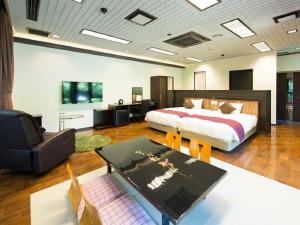 TV a/nebo společenská místnost v ubytování LiVEMAX RESORT Jogasaki Kaigan