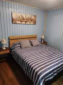 Cama ou camas em um quarto em Cabañas San Fernando