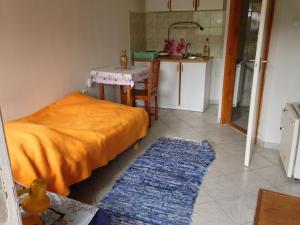 Posteľ alebo postele v izbe v ubytovaní Petra Apartmanok