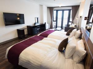 TV a/nebo společenská místnost v ubytování LiVEMAX RESORT Jogasaki Kaigan