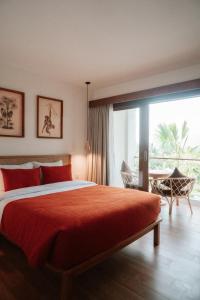 Llit o llits en una habitació de PORTER HOTEL - Surf & Yoga Retreat