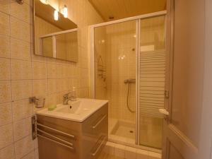 a bathroom with a sink and a shower at Maison Morillon Village, 3 pièces, 7 personnes - FR-1-642-16 in Morillon